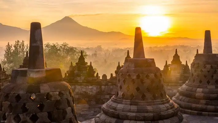 Borobudur temple glowing at sunrise, part of Borobudur Sunrise Package