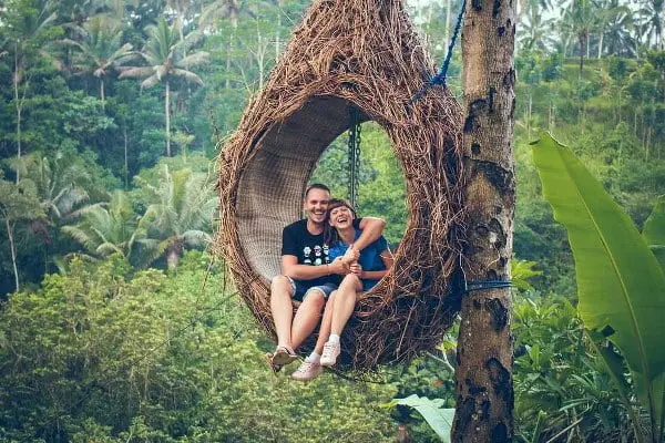 Couple enjoying jungle swing, part of Bali Honeymoon Package for 7 Days