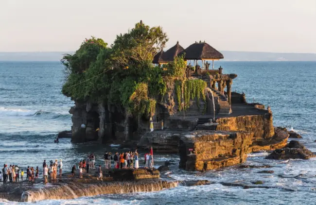 Tanah Lot temple standing in the sea, a Must Do Experience in Bali