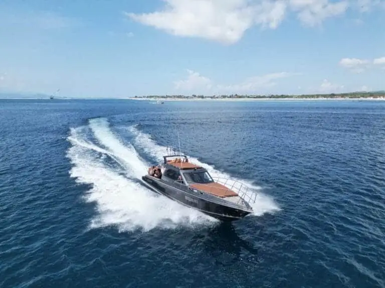 High-speed luxury yacht cruising during the Sunset Escape Private Cruise by Black Wood Boat Bali – part of our exclusive Nusa Penida Boat Trips in premium bali tour packages.