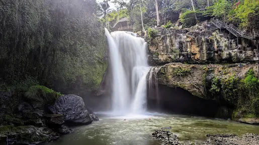 Bali day tours to hidden waterfalls with local guides in lush nature.