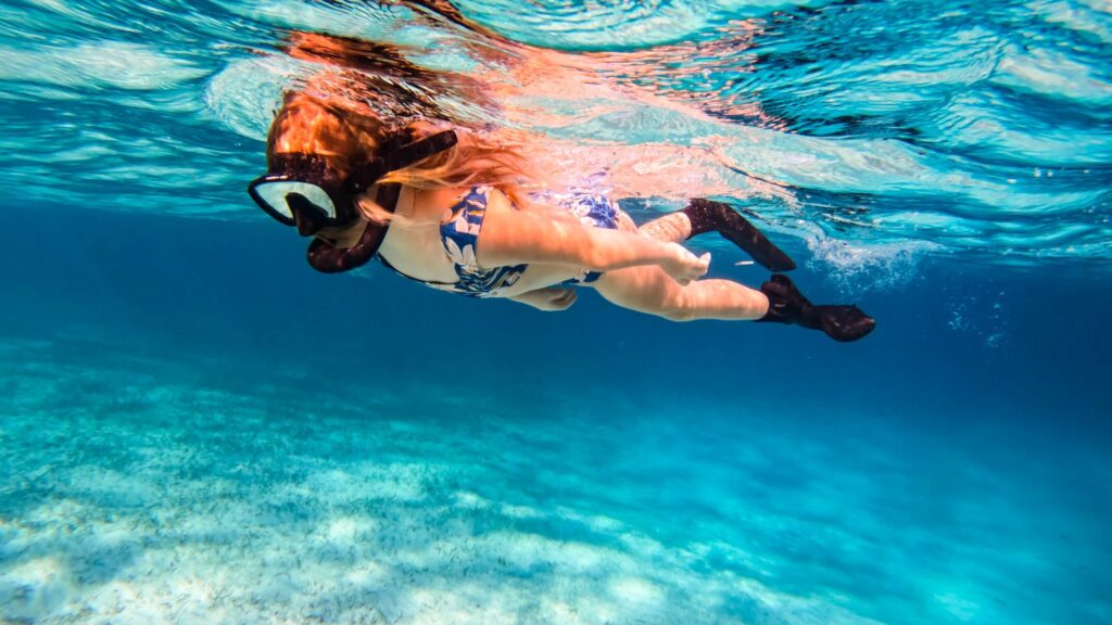 Couple enjoying snorkeling adventure tours in Bali