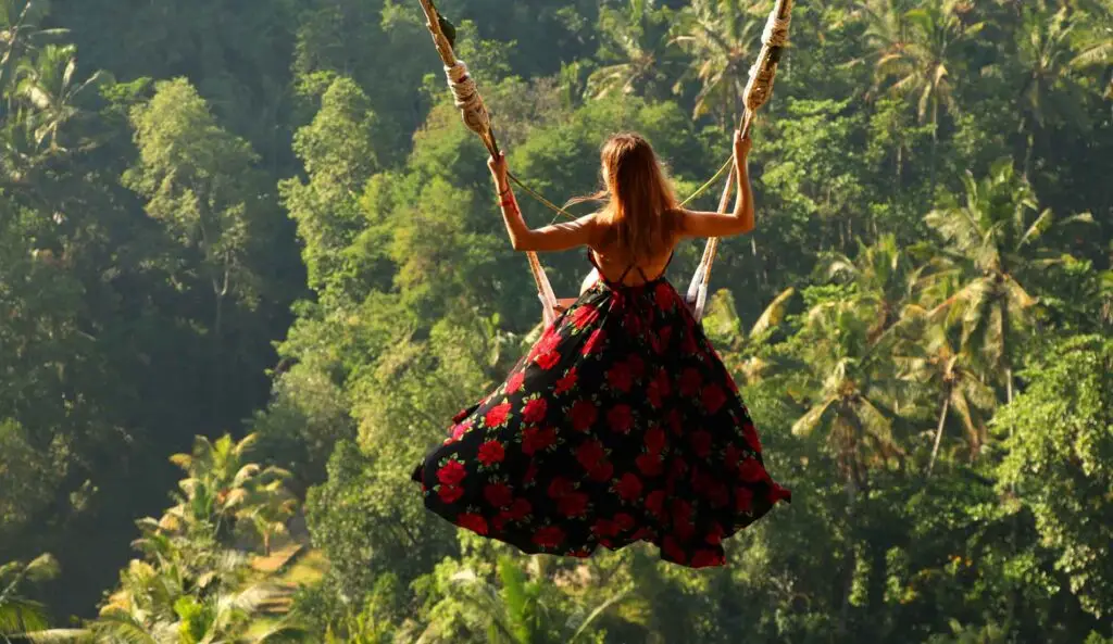 Swing experience in Ubud jungle as part of Tour Bali Package adventure
