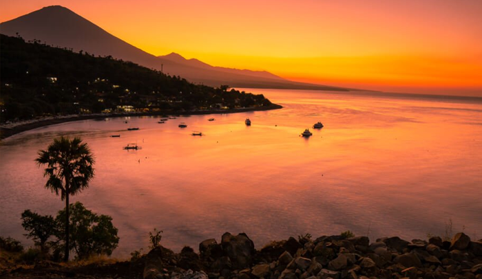 Bali sunset with mountain background on custom Bali Day Tour