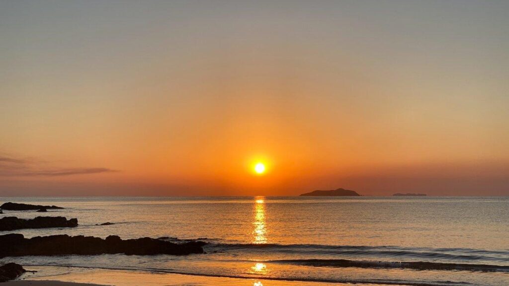 Golden Bali sunset over the ocean during a Bali Day Tour trip