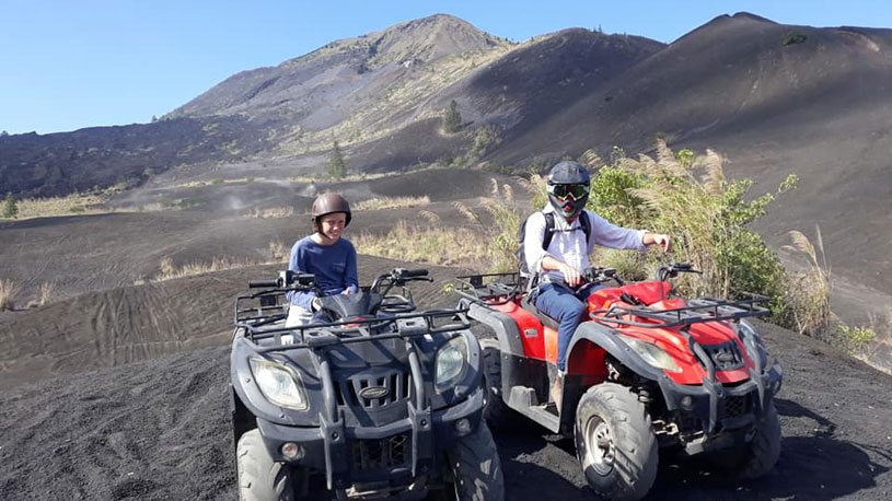 ATV ride adventure across Mount Batur trails with Bali Nature Tours exploration.