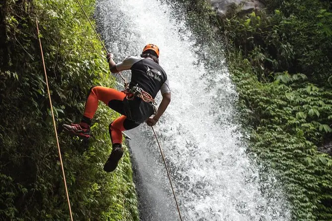 Waterfall climbing and canyoning challenge with Bali Adventure Tour for thrill seekers.
