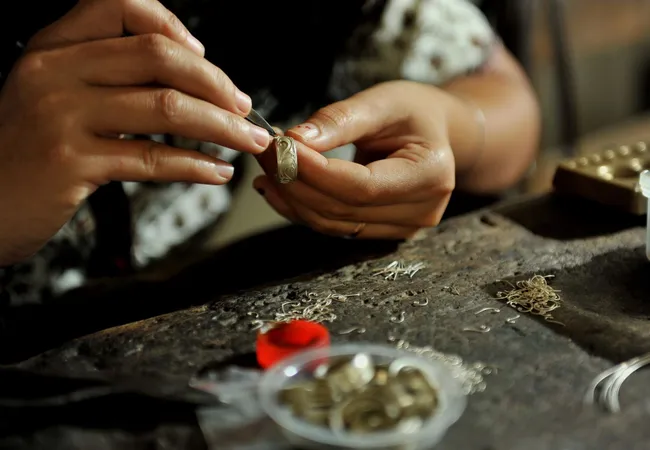 Learning traditional jewelry making at Celuk Village on a cultural Bali Day Tour.